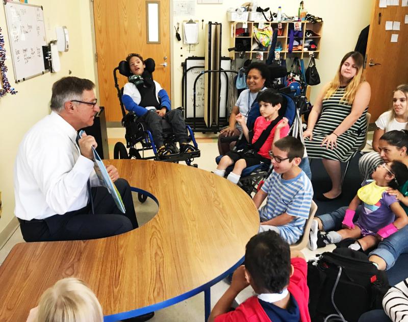 Senator Rodrigues reading to the kids at the Schwartz School on Friday